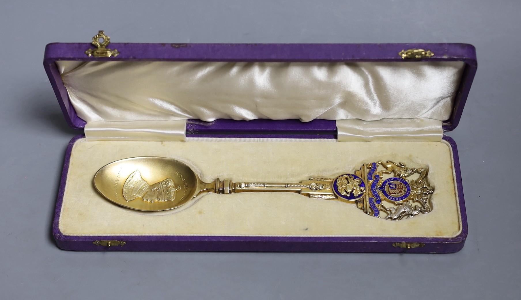 A cased Edward VIII Coronation silver gilt and enamel spoon, the bowl embossed with the bust of Edward VIII, Turner & Simson Ltd, Birmingham, 1936, 20.9cm, gross weight 98 grams.